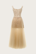 ROSANOR Nude Sonata midi dress styled for wedding guest or formal evening event